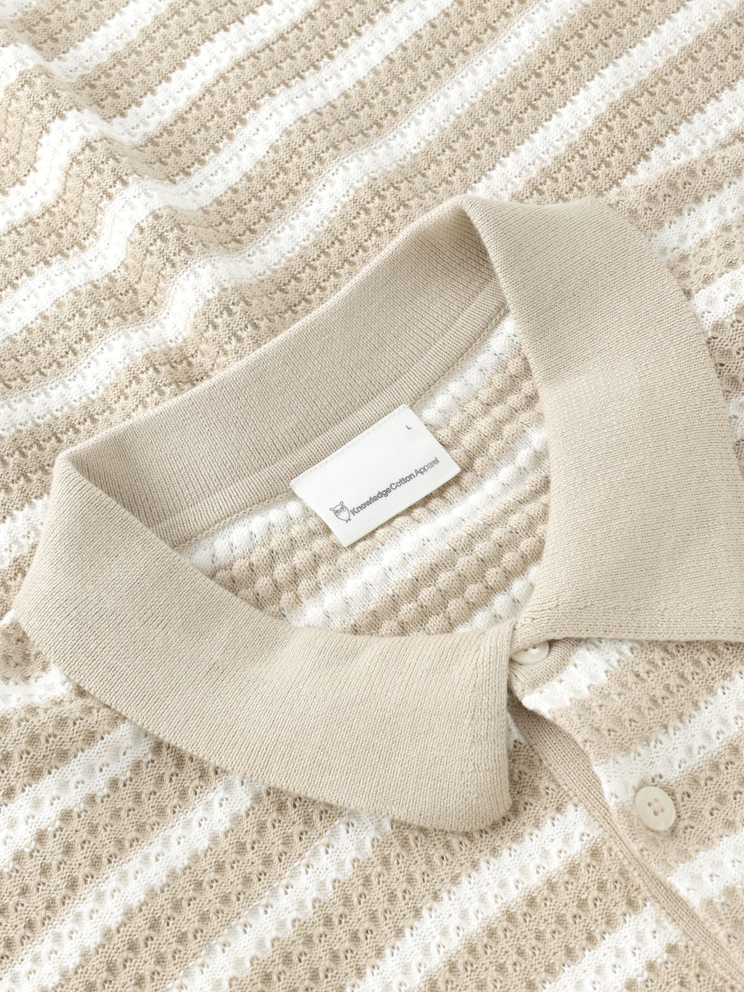Gestricktes Langarm-Poloshirt mit Streifen aus Bio-Baumwolle
